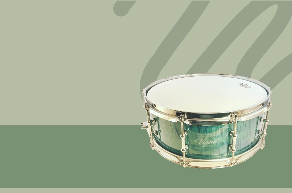 Vigent Drums Turquoise Maple drum head with stylized background